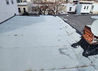 Flat roof condition documented during an inspection