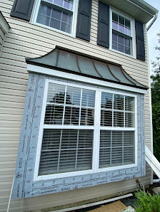 Window flashing and exterior restoration in progress